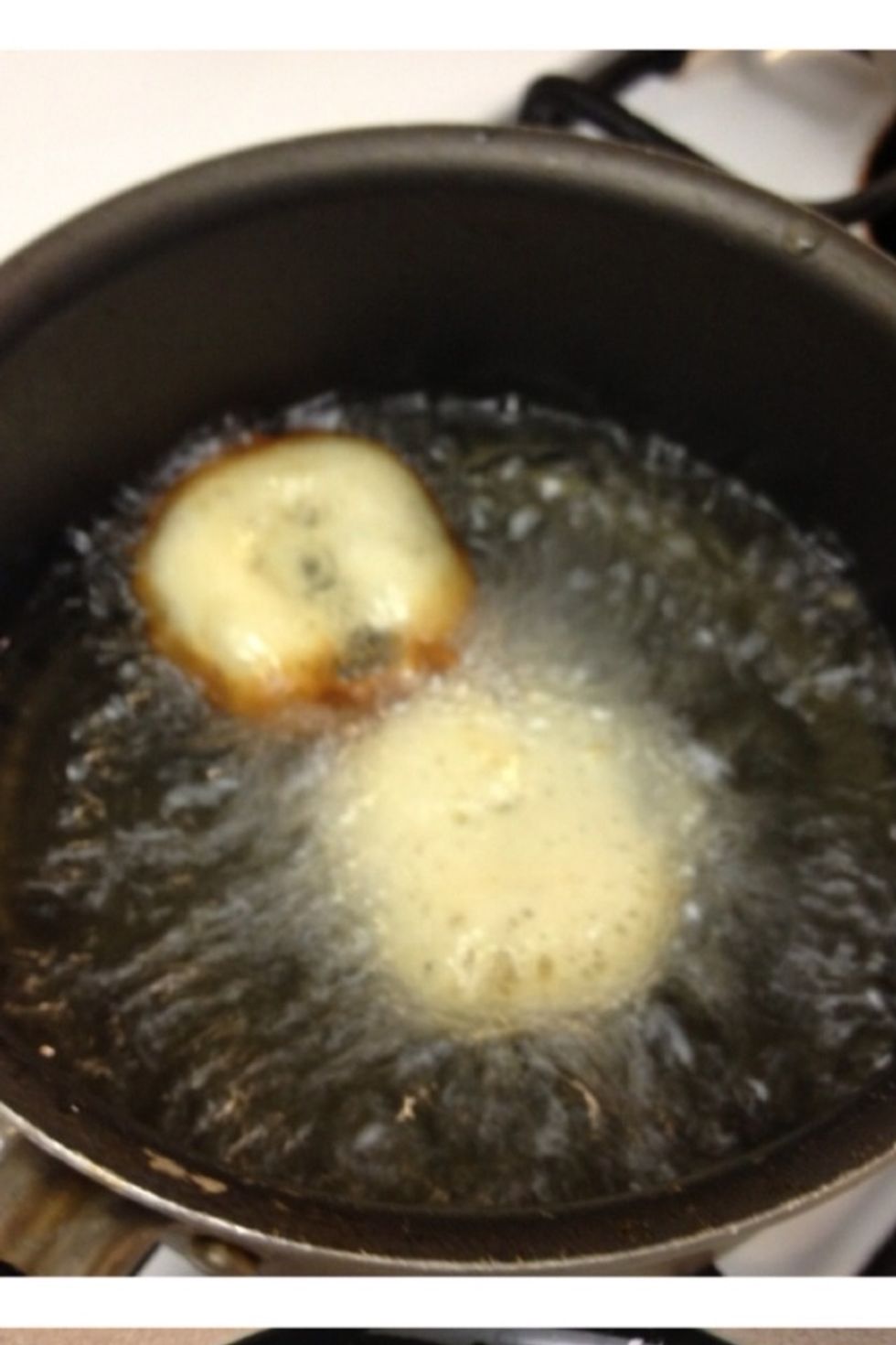 Then add Oreos to pot, no more than 1-2 at a time. (Sometimes they can get fry real quick, we don't want them to burn.) When one side is brown, flip over, it takes less than a minute.