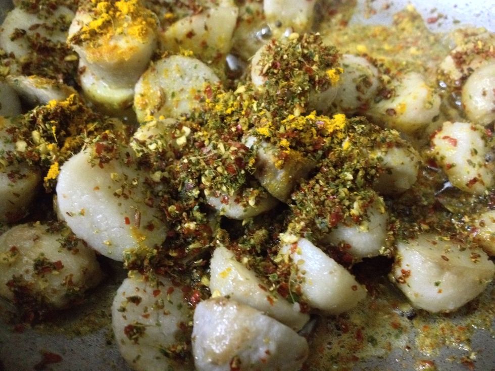 Then add powder of turmeric, red chilli and curry leaves to the Arbi.