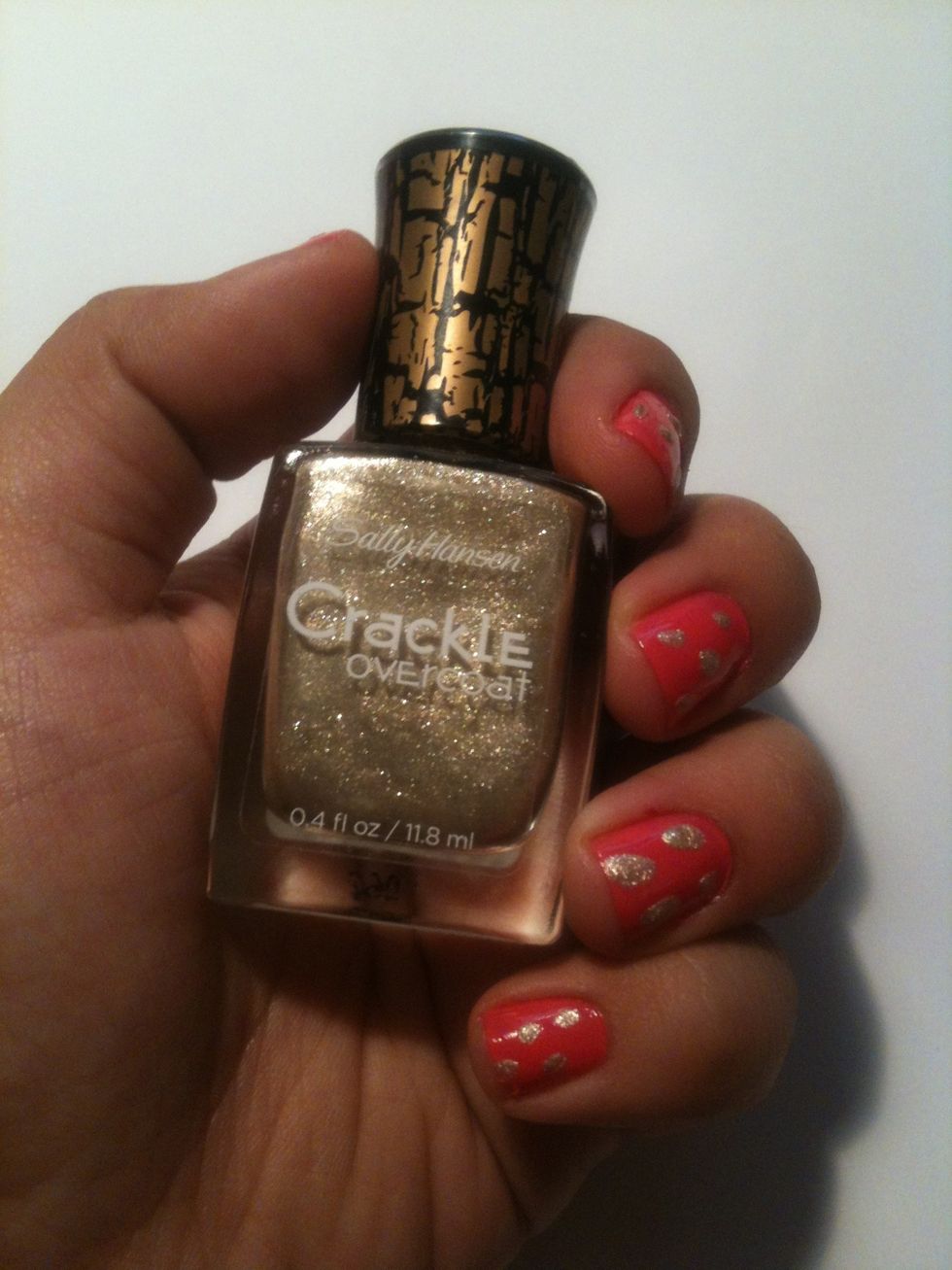 Then add random gold spots on nails.