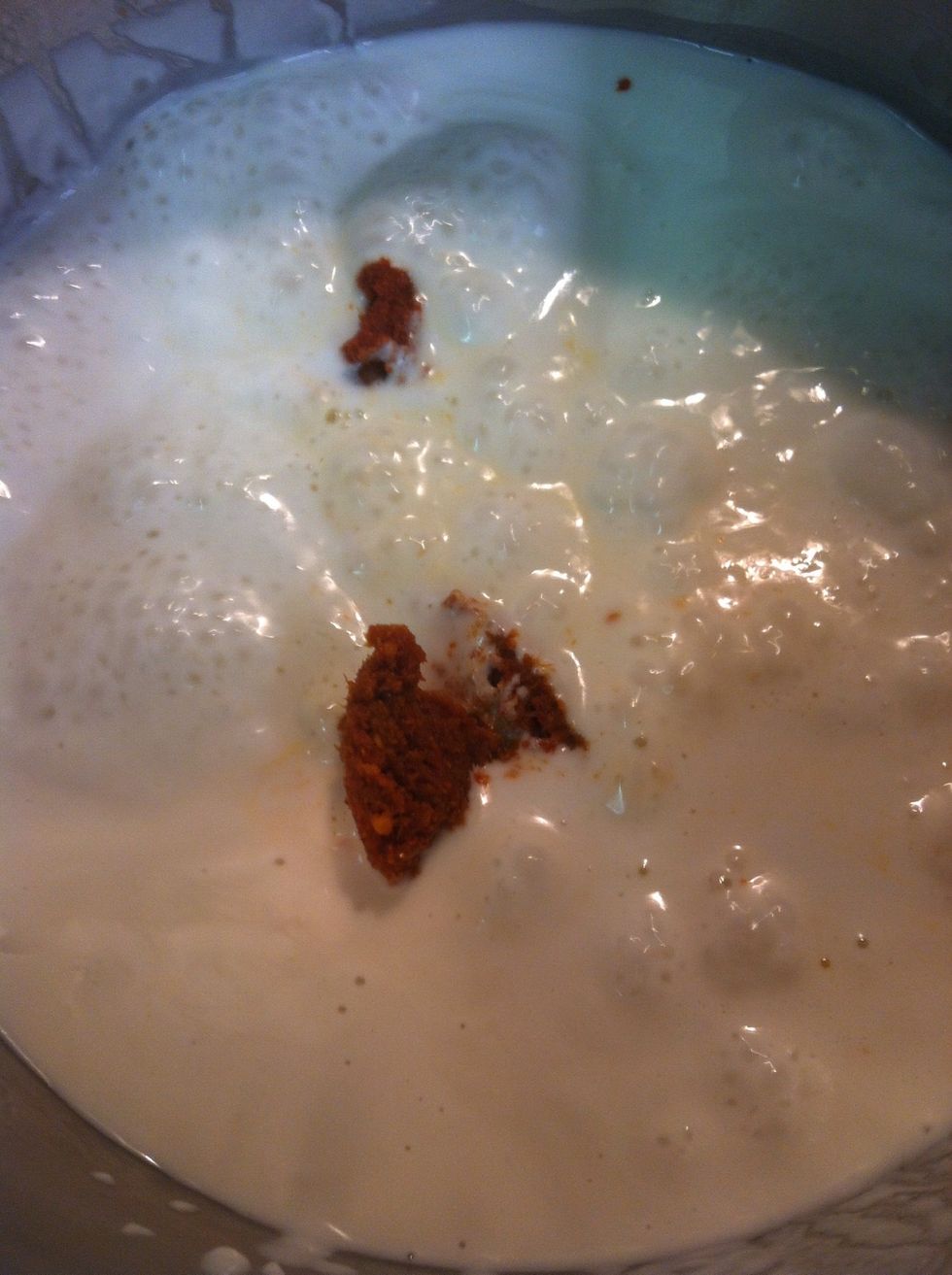 Then add red curry paste .. In each brand of paste it's different how is hot , I use more than 1 tbl because I like spicy one