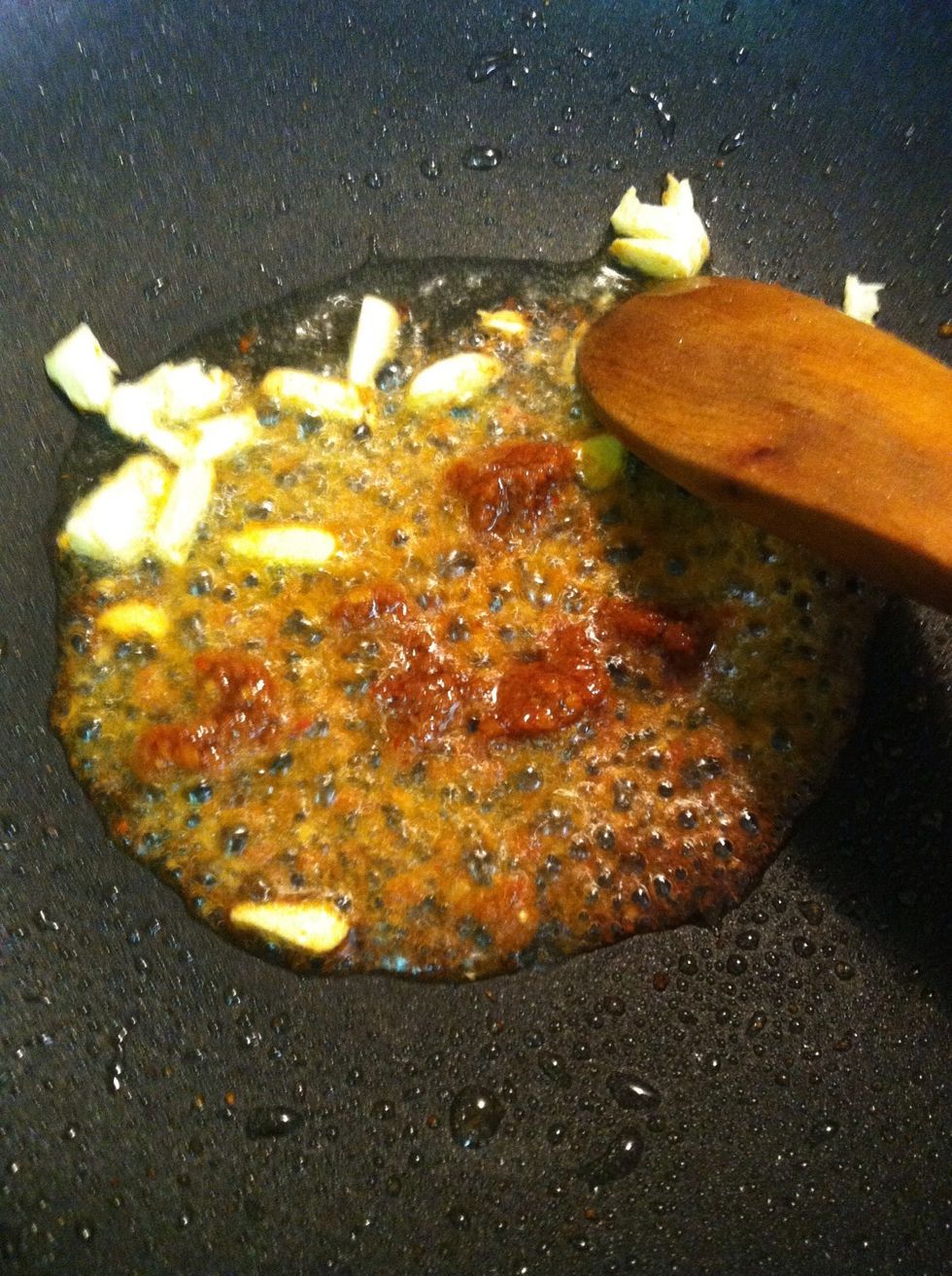 Then add red curry paste stir until smell nice of the curry paste