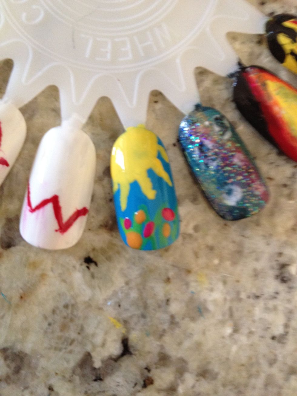 Then add some orange (or any other color you want) dots for other flowers