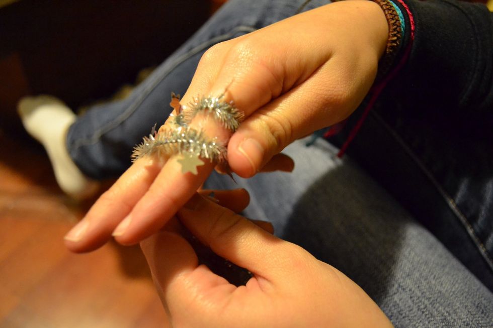 Then add the 2nd finger and wrap