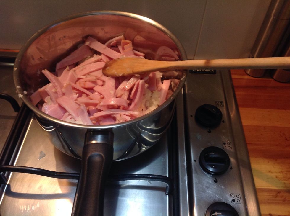 Then add the bacon and onion