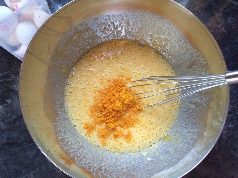Then add the butter, orange zest, orange juice, the 8 eggs and whisk it all together. Don't need to whisk it to well just so that the ingredients are combined.