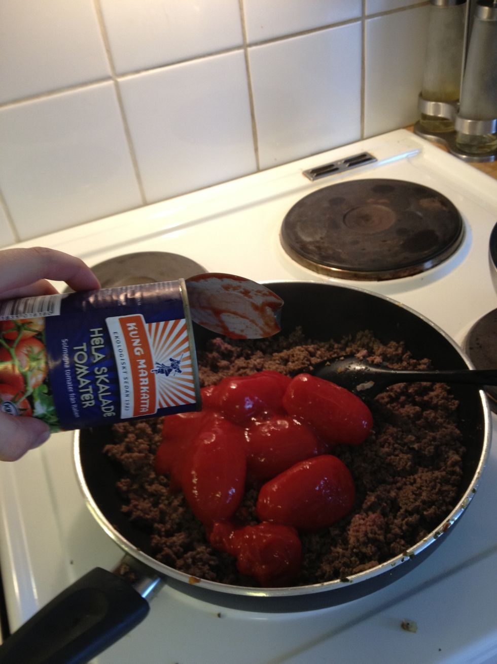 Then add the canned tomatoes. .