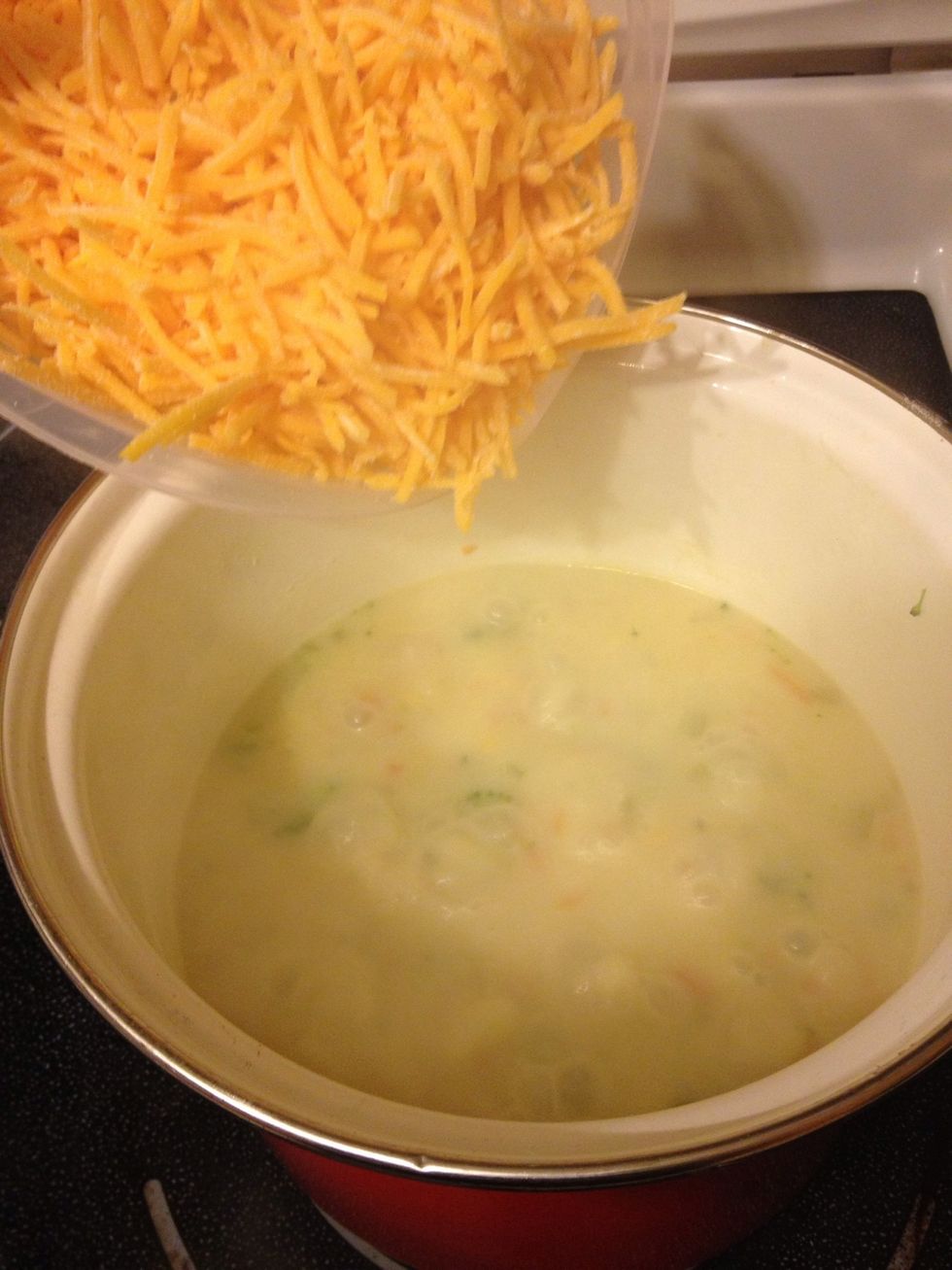 Then add the cheese and let melt. I turned the heat down to medium low after the cheese melted.