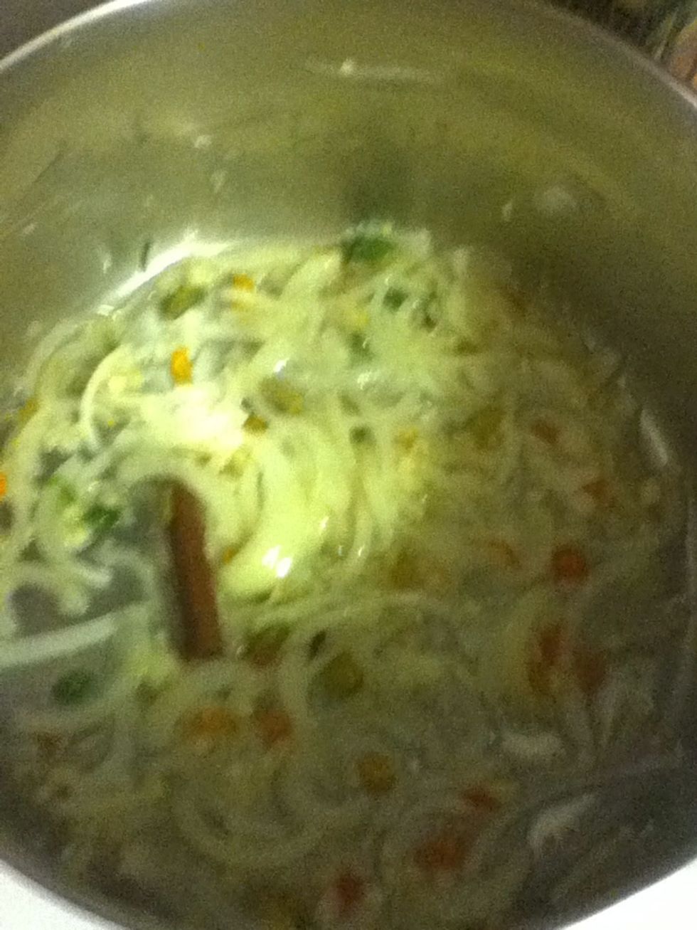 Then add the chiles and the whole spices and let 'em get to know each other for several minutes.