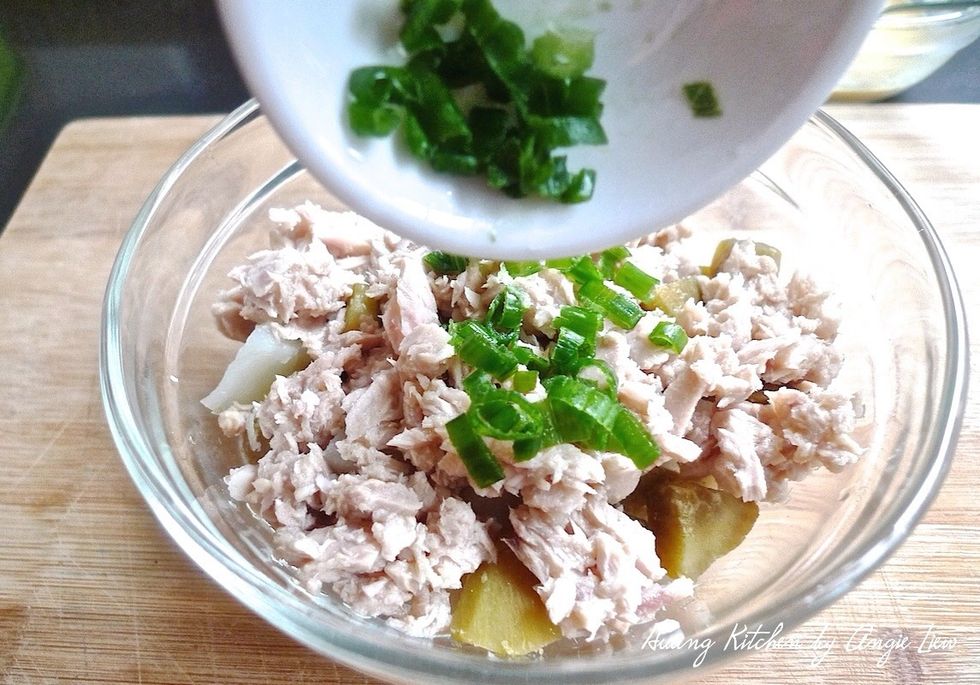 Then add the chopped spring onion.