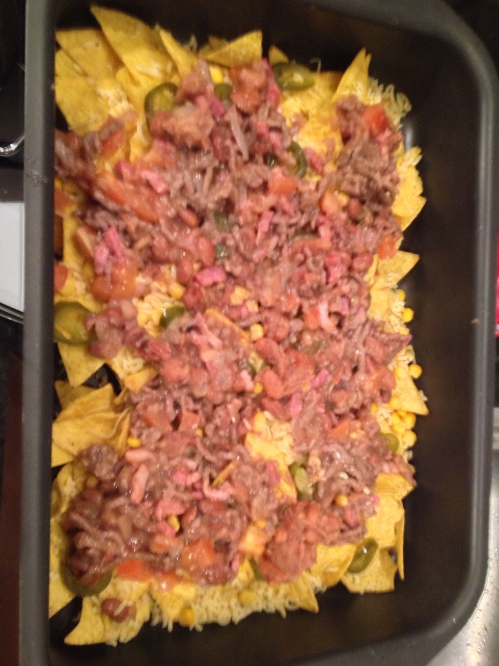 Then add the contents of the pan in the oven dish