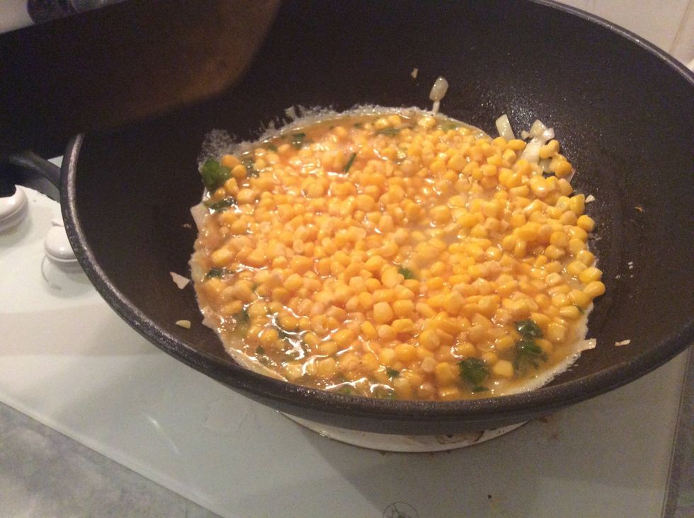 Then add the corn and continue to stir for about 3 minutes