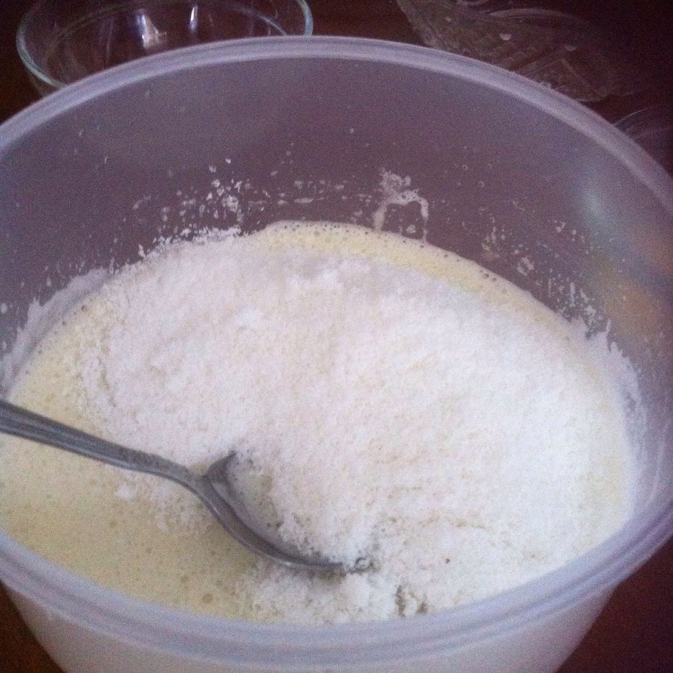 Then add the flour and coconut and mix
