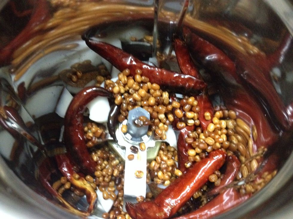 Then add the fried dried red chilli and coriander seeds