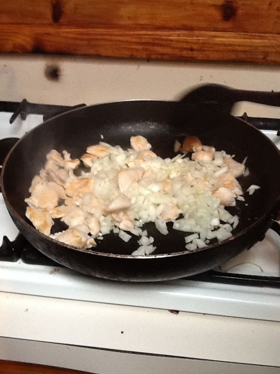 Then add the garlic and onion then stir till brown.