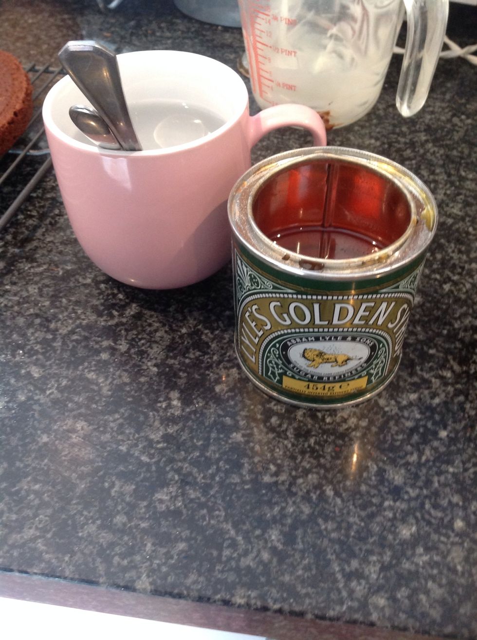 Then add the golden syrup to the chocolate and butter melted mix. TIP: leave spoons in a glass of hot water, it makes it a lot easier for the syrup to come of the spoon!