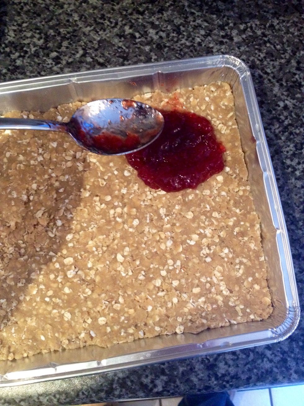 Then add the jam. Spread it to within 1/4 inch of the edge