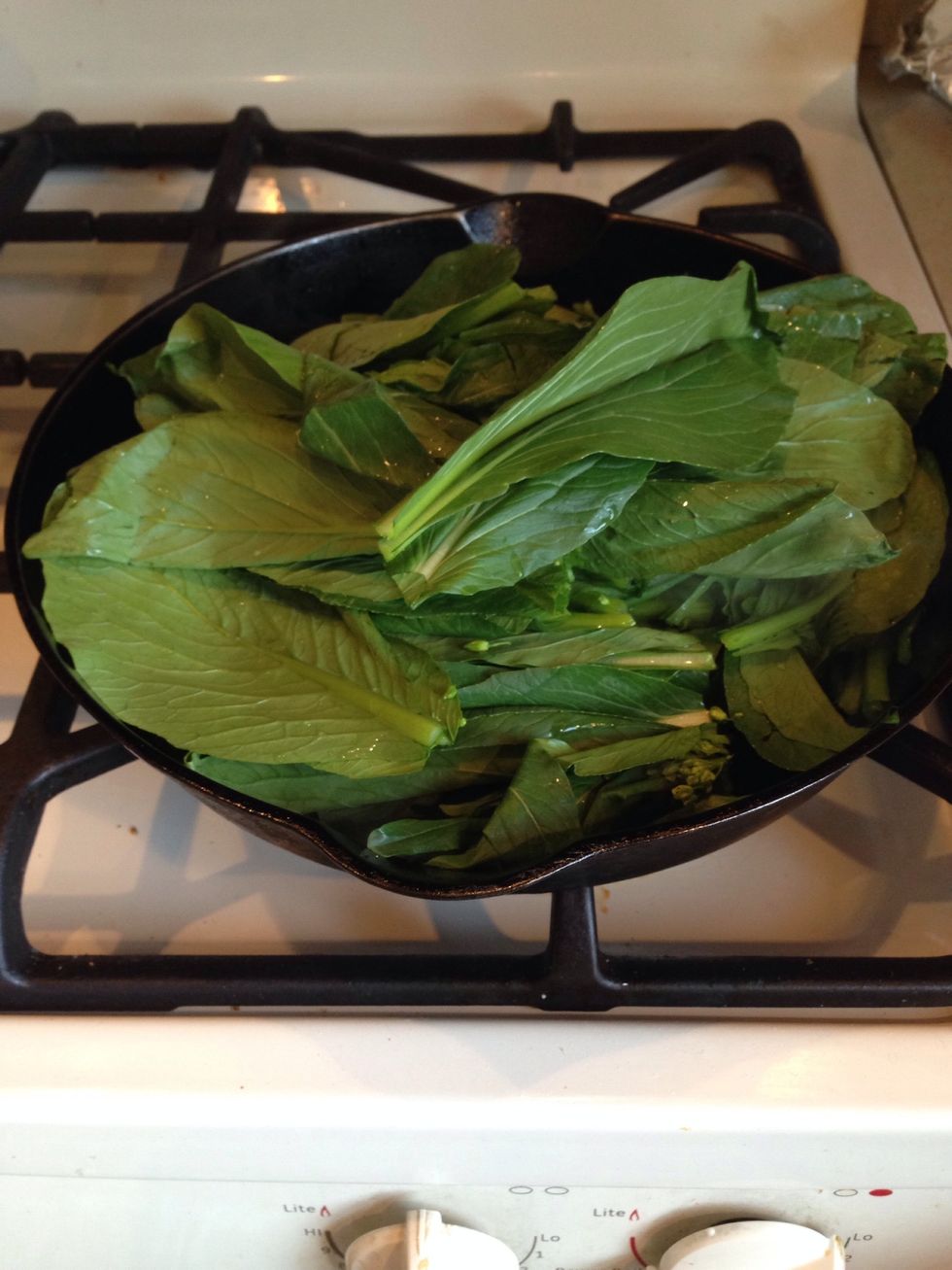 Then add the leaves and stir fry for 4 additional minutes.