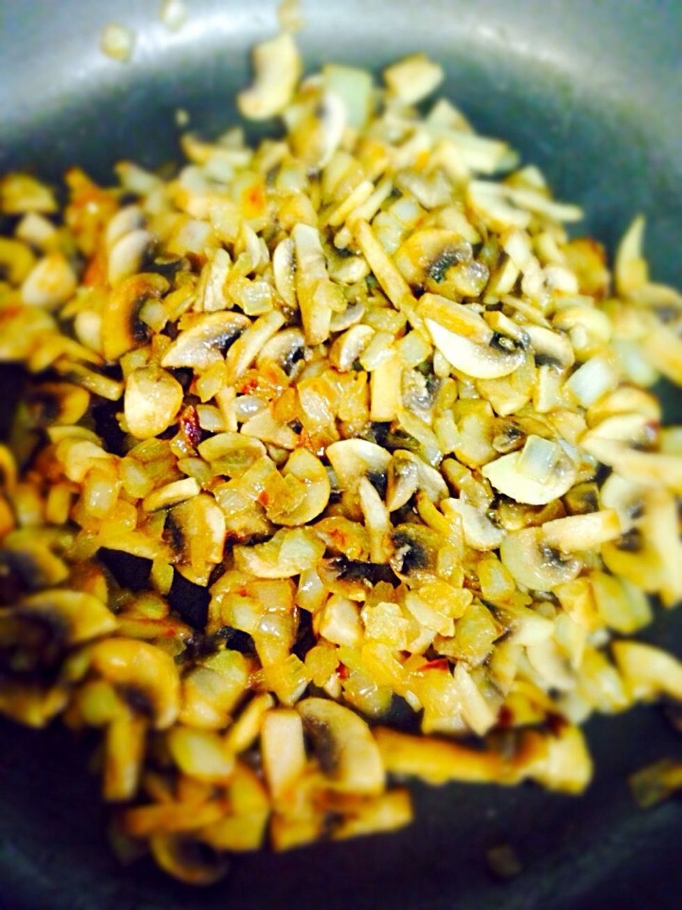 Then add the mushrooms and season with salt pepper and garlic powder. Cook till it's completely done