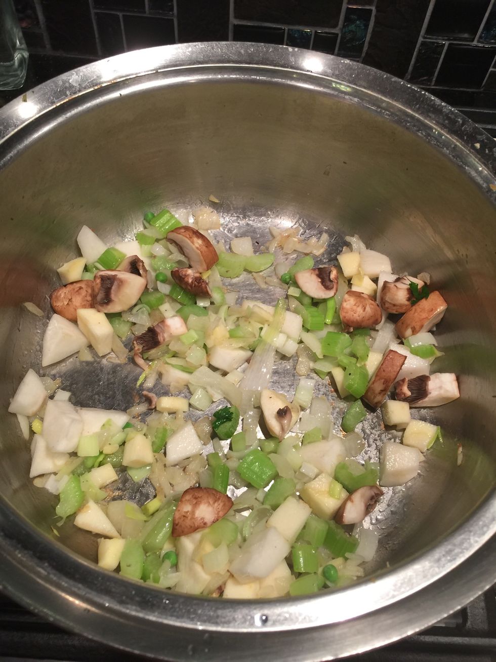 Then add the mushrooms, rutabaga and turnips.