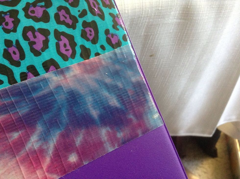 Then add the next stripe of tape, barely covering the marks.