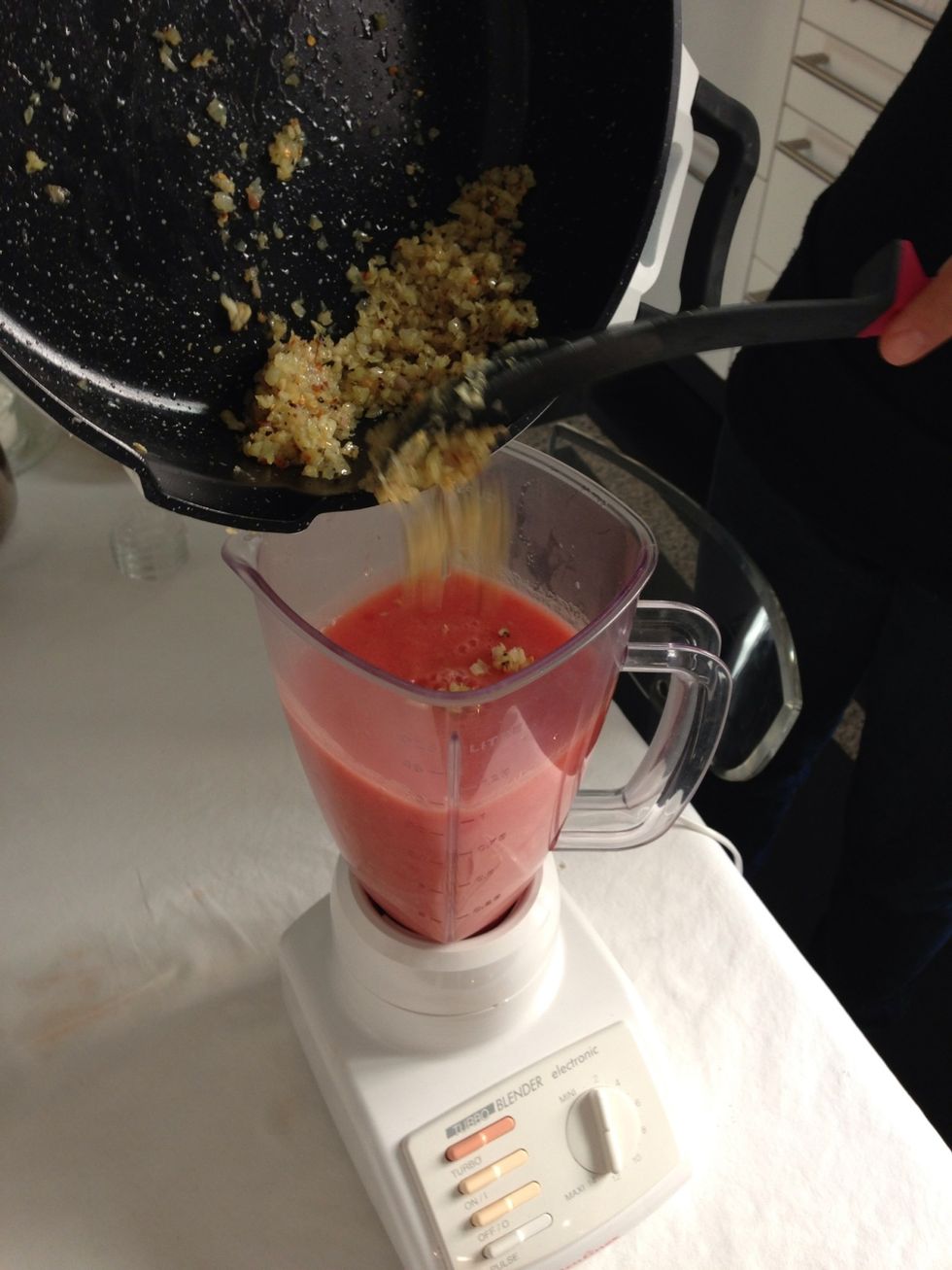 Then add the onion garlic in the blender and give it few turns....