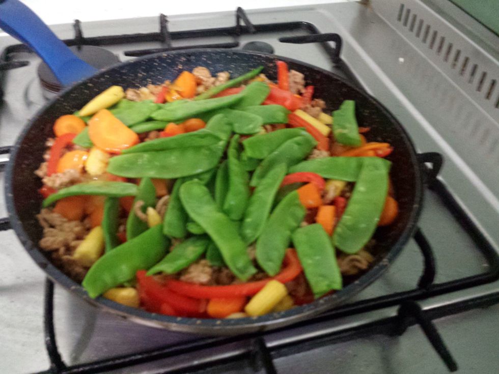 Then add the other colour that we needed, the snow peas.