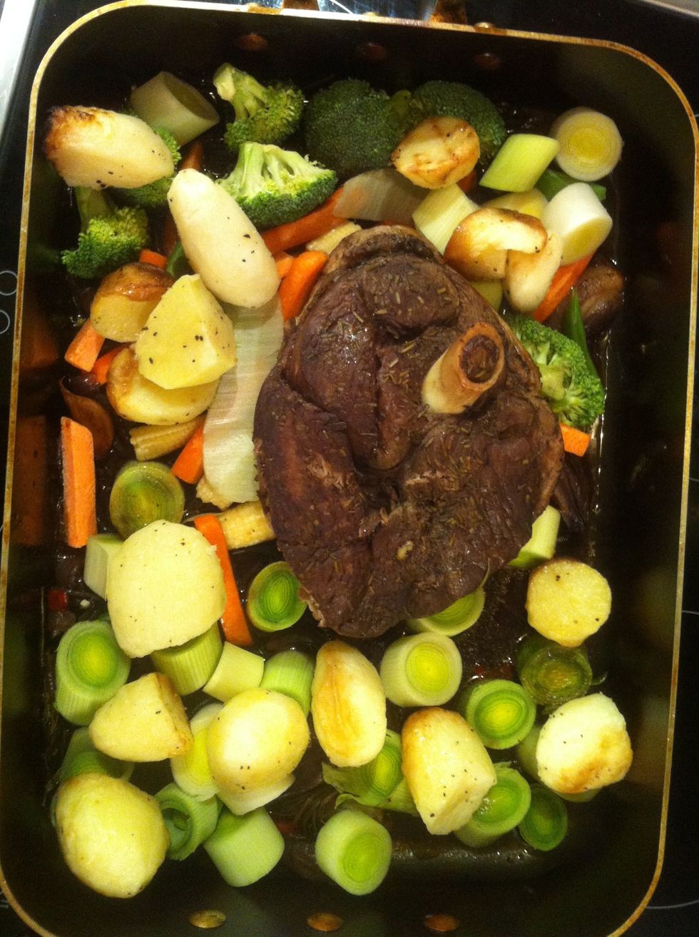 Then add the par boiled potatoes - on top of the vegetables so they roast and  not pan fry.