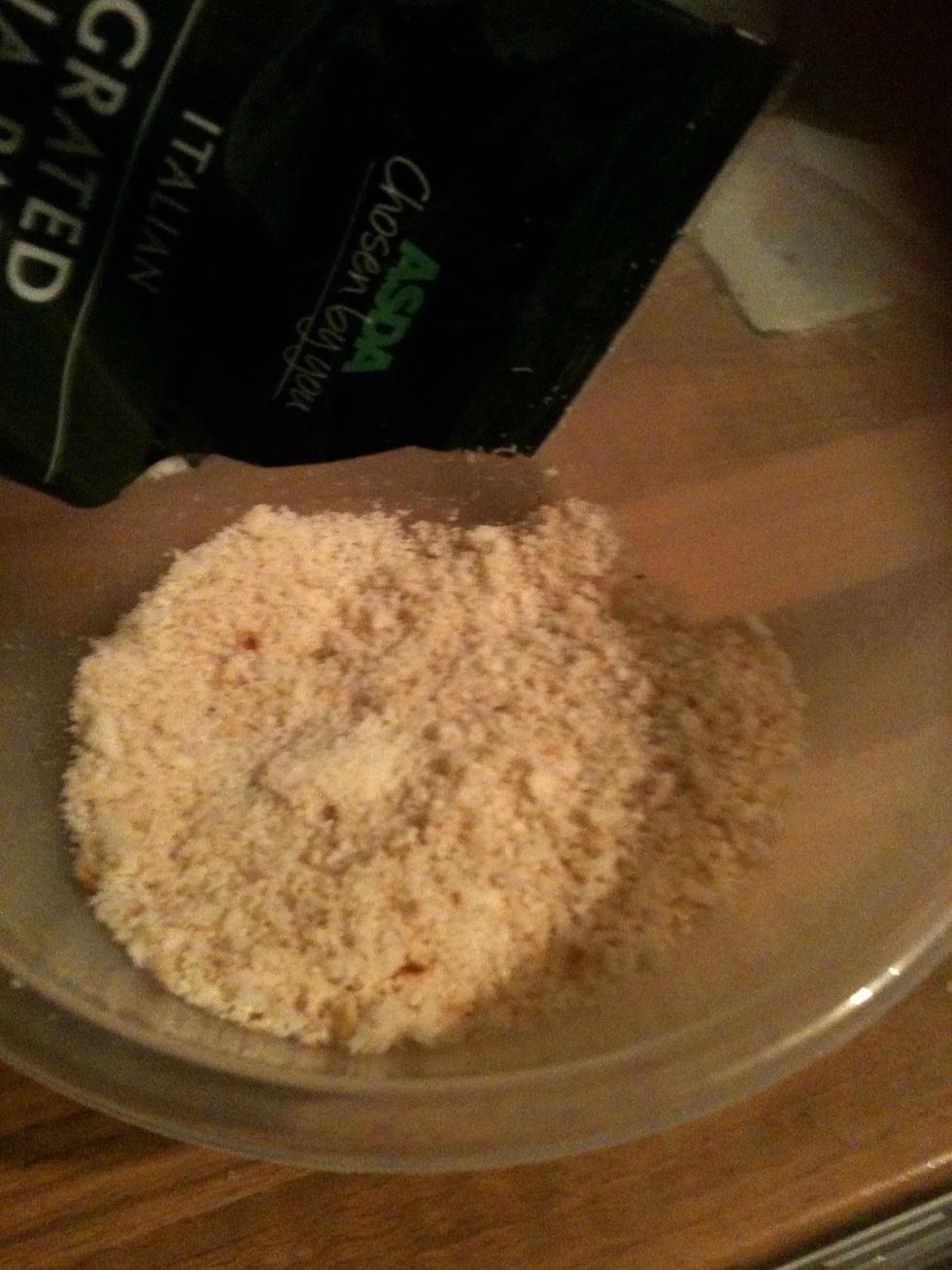 Then add the Parmesan to the breadcrumbs, I just used store bought fresh grated stuff. Mix it well but don't squeeze it, keep it crumby! :)