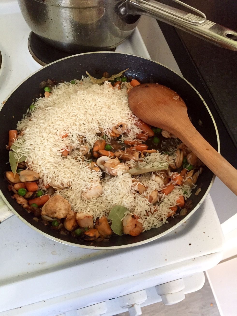 Then add the rice. Ideally it should be short grain but I only had basmati so that had to do!