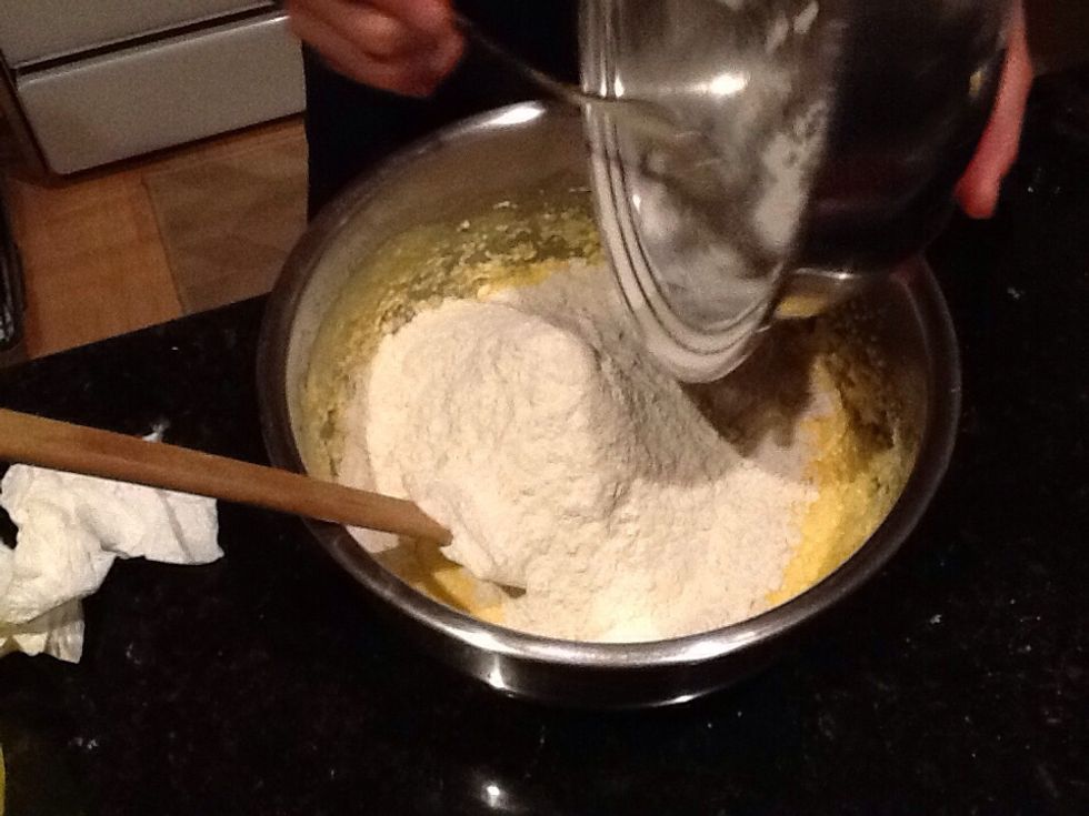 Then add the sifted flour and baking powder into the dough