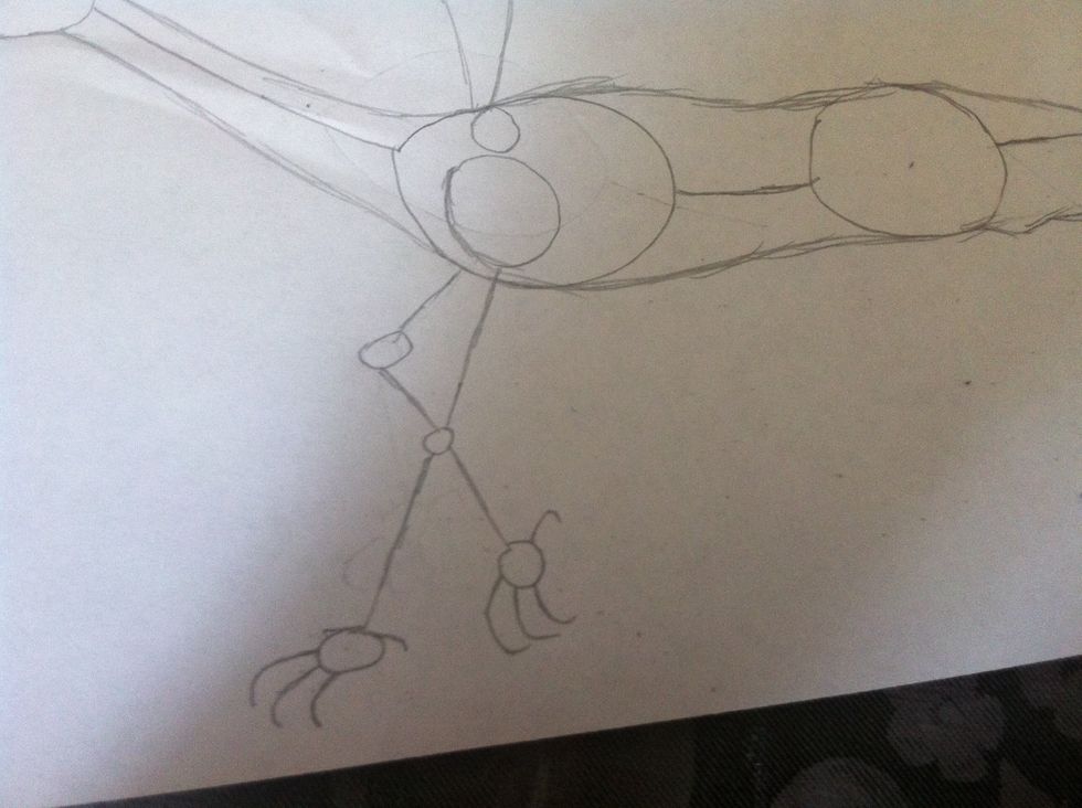 Then add the sketch of the legs and feet