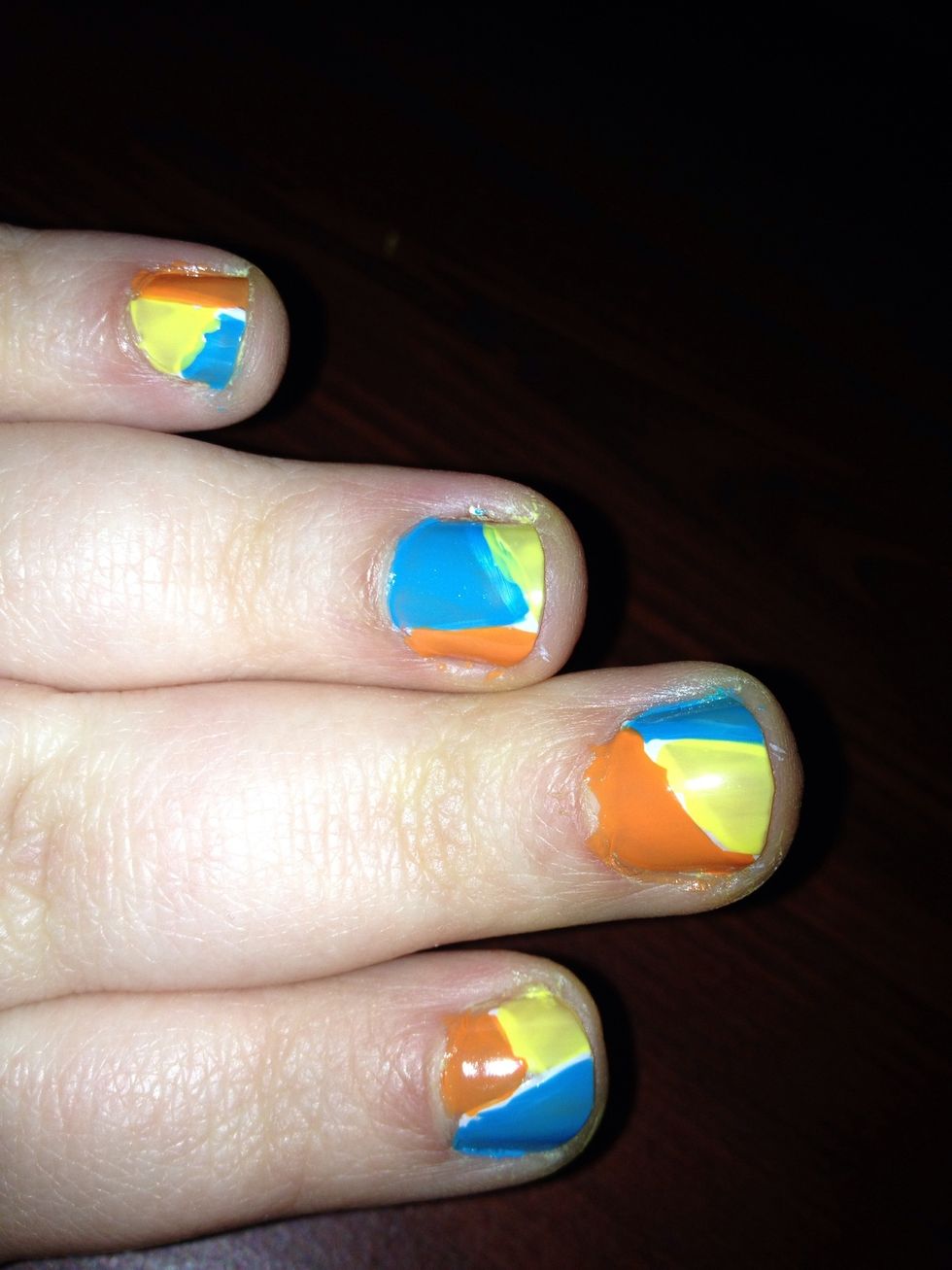 Then add the third color. It will look messy. But once it dries you can clean it up!