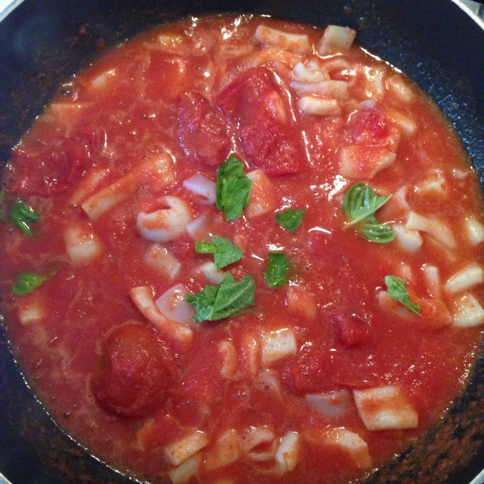 Then add the tomato sauce and the basil leaves, cook for other 10 minutes