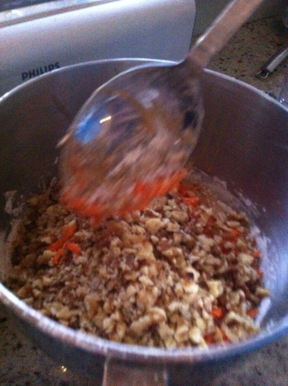 Then add the walnuts and the grated carrot
