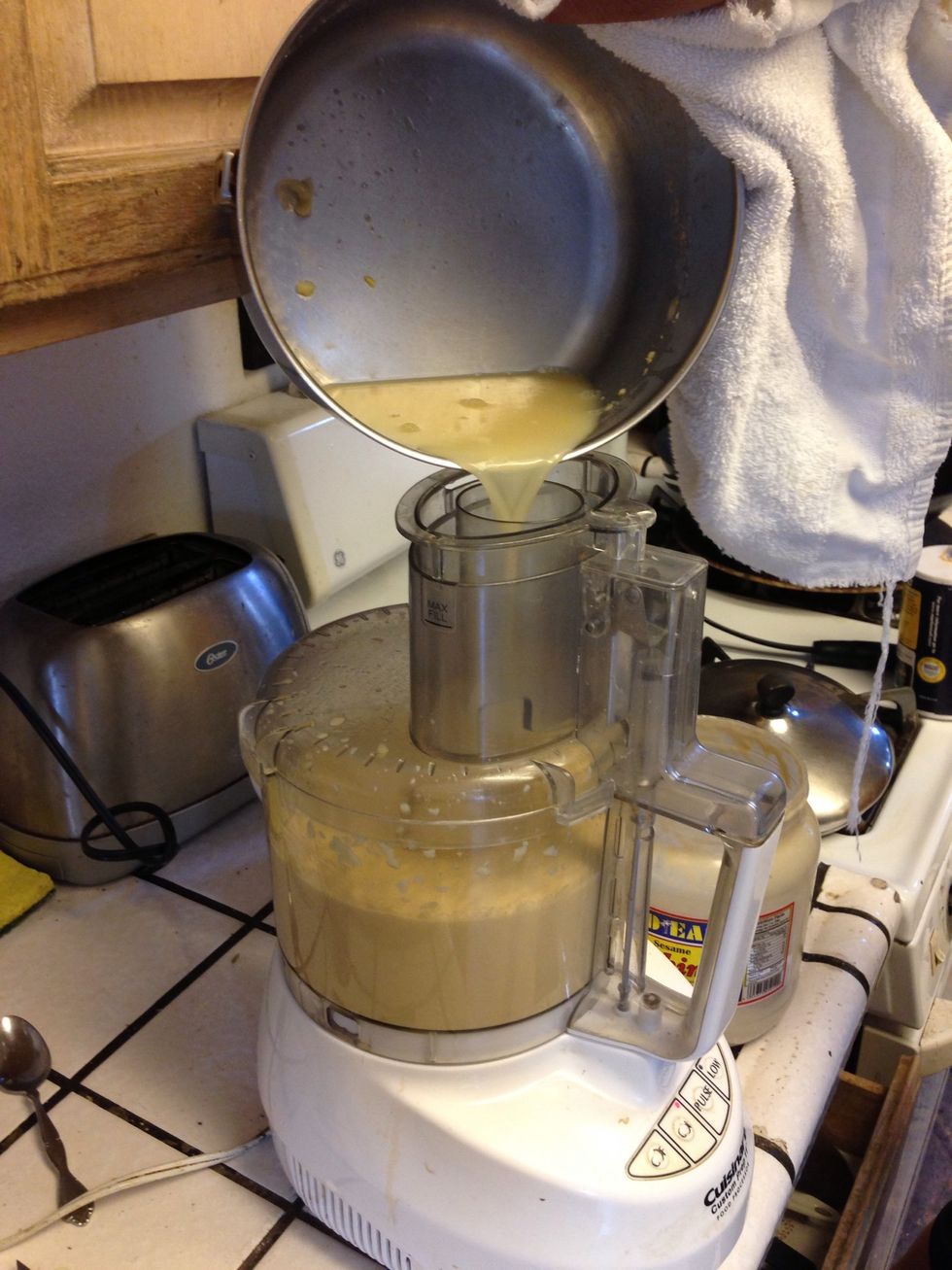 Then add the water from cooking the garbanzo beans