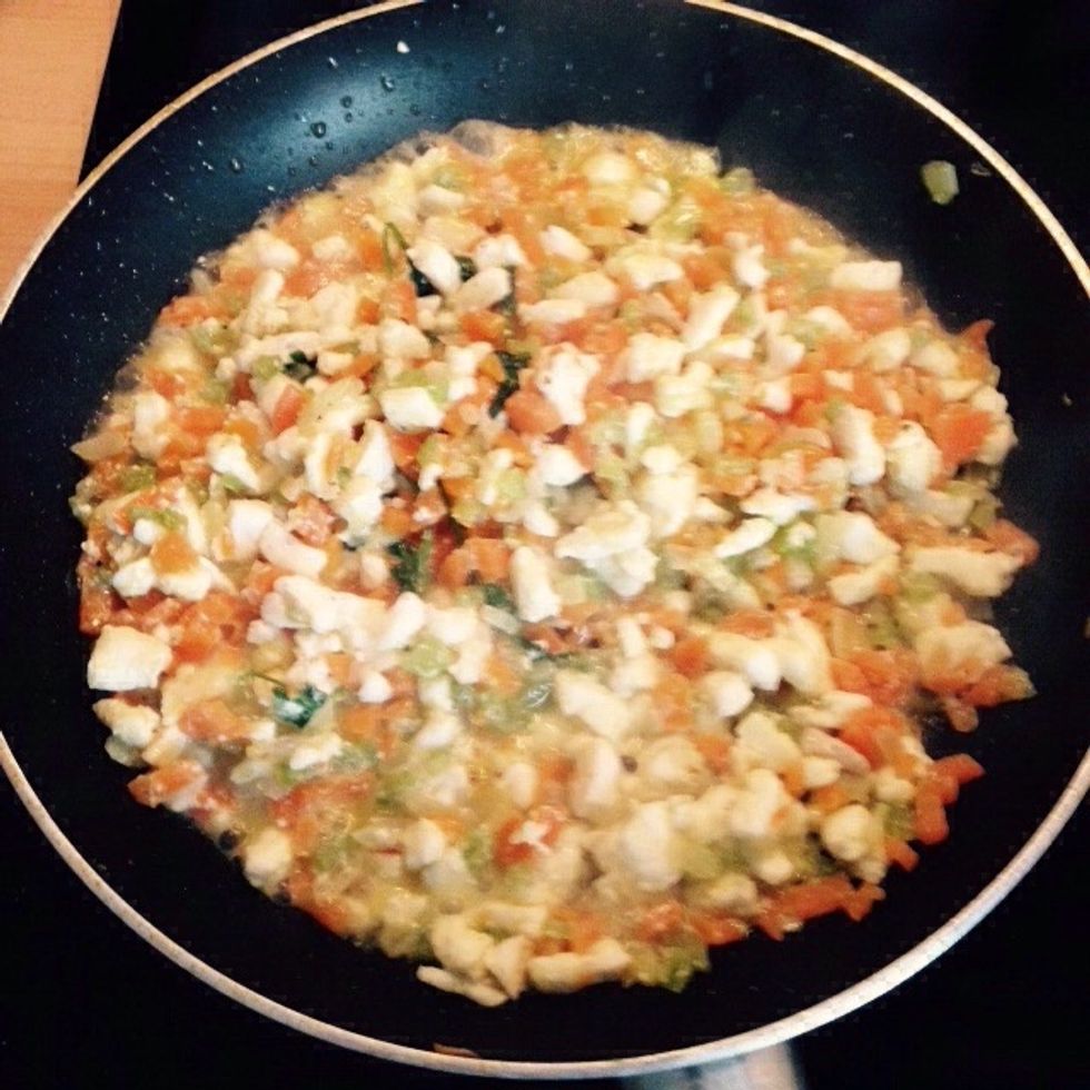Then add the white wine and turn the heat on high