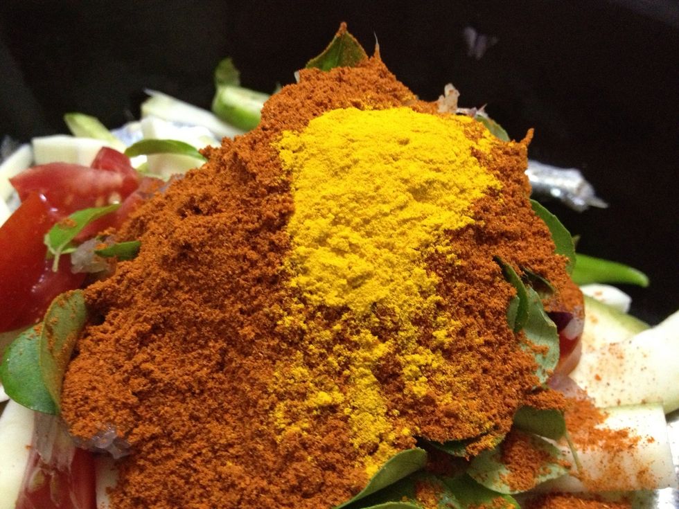 then add turmeric powder
