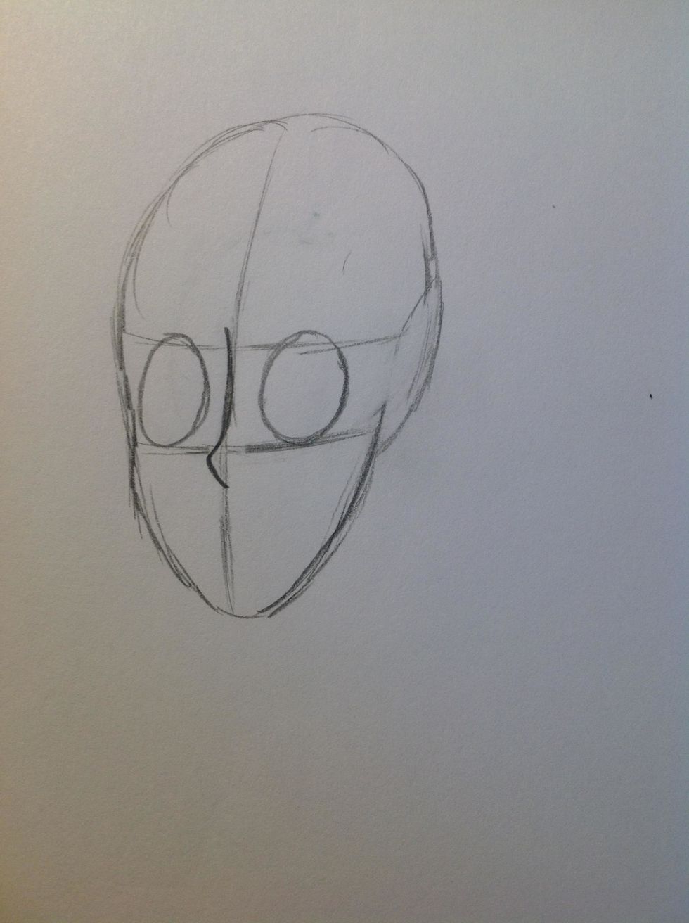 Then add two circles for where the eyes should be. Make sure that there is a good amount of space between them; not too little or not too much.