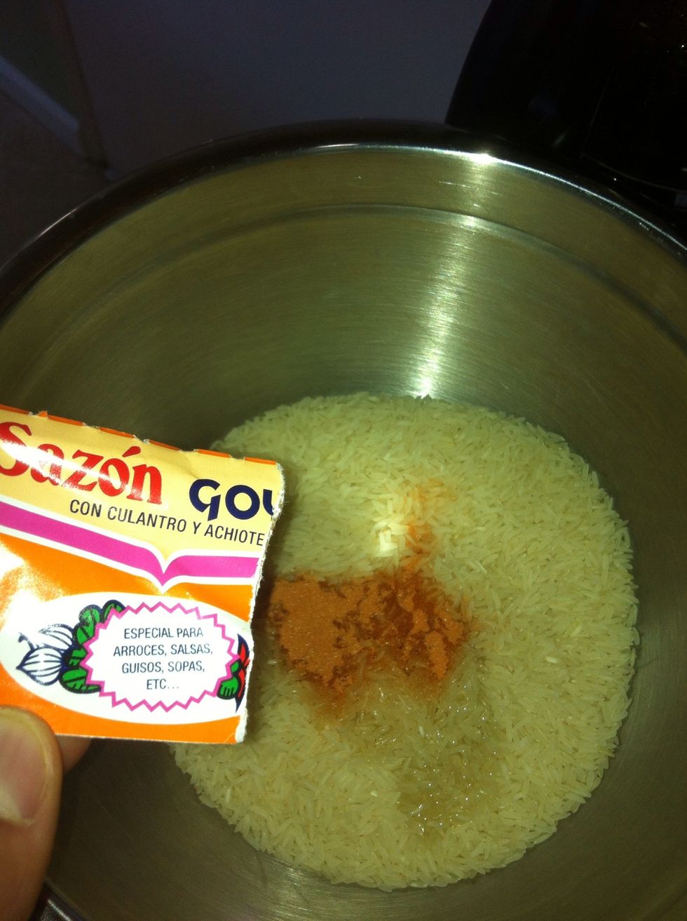 Then add two packets of sazon it makes it a light orange color