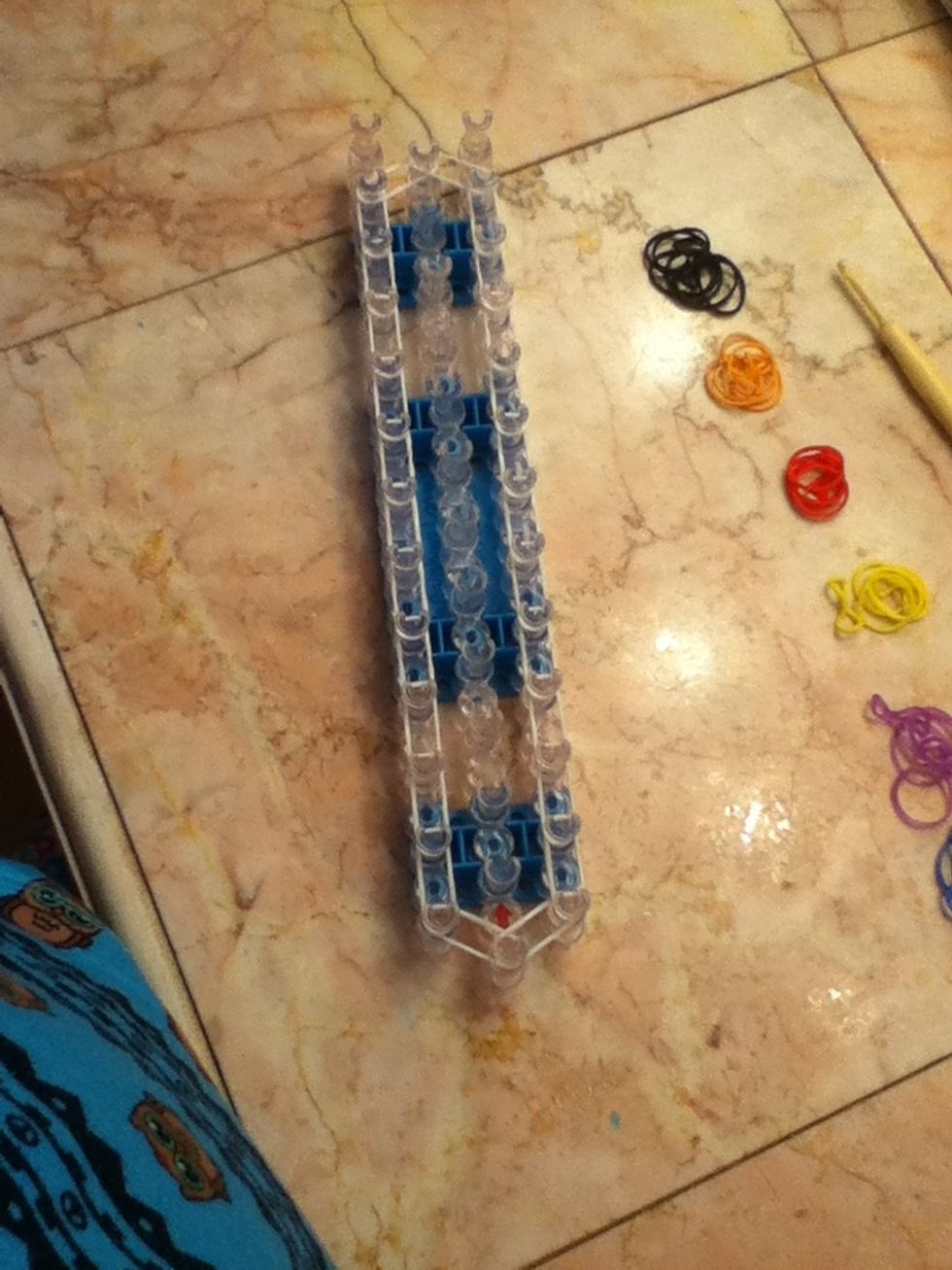 Then add (white) bands to the other side of the loom. This is what it should look like when your done! Go diagonal on the last part.