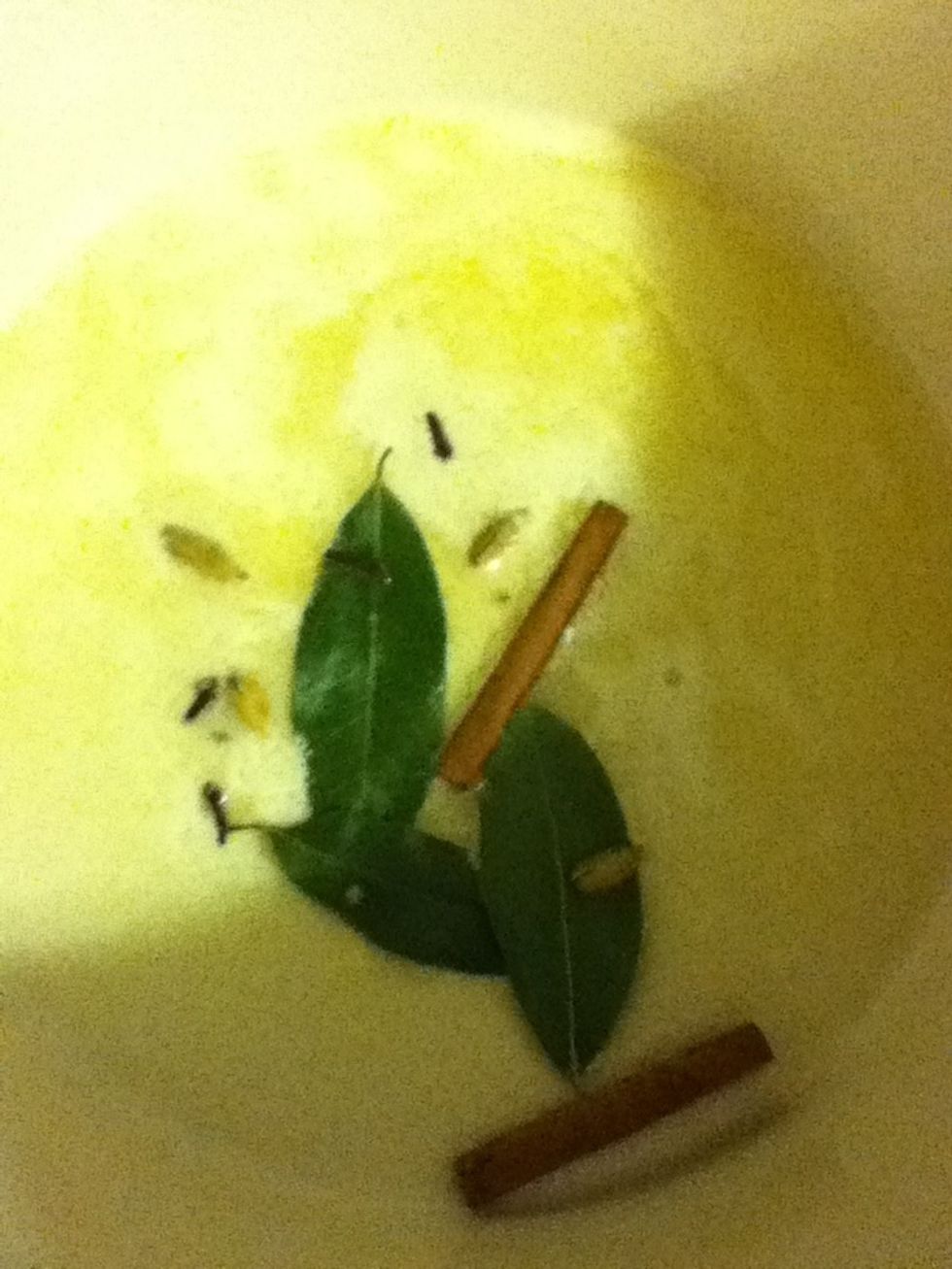 Then add yer whole spices and sizzle 'em for a minute.
