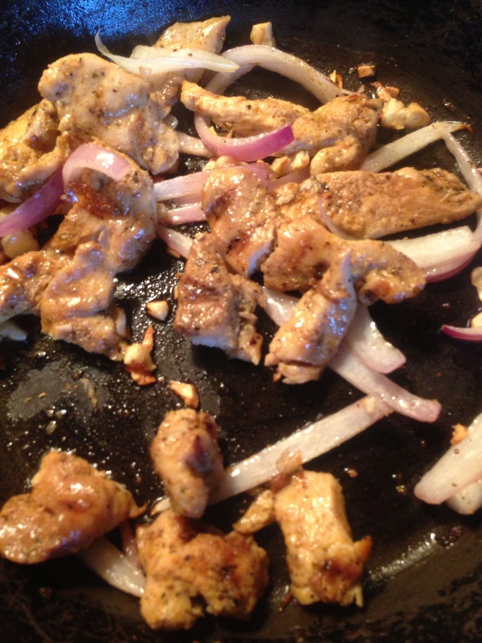 Then add your chicken and cook for about 1 minute.
