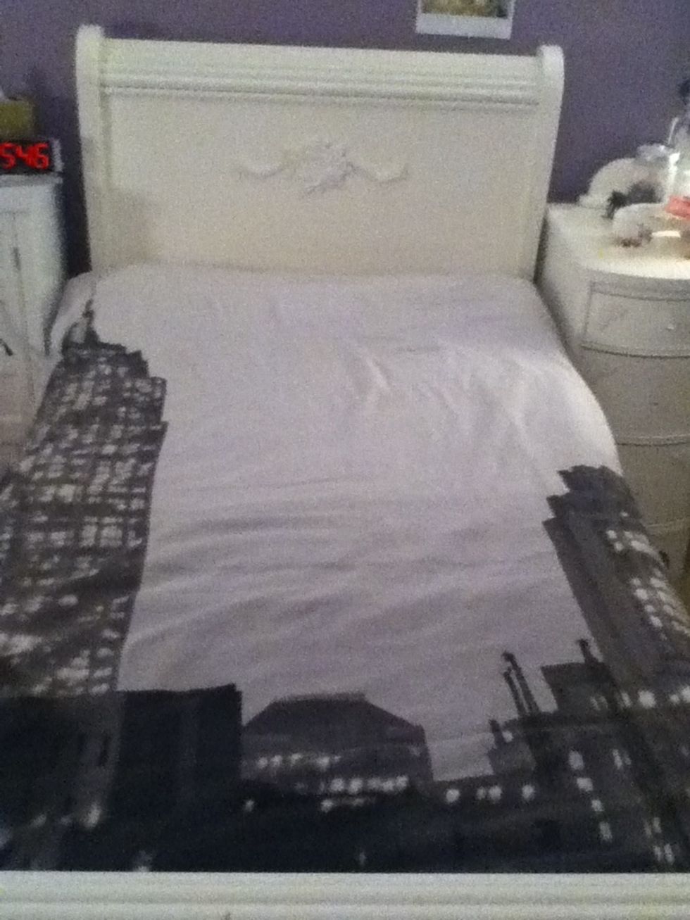 Then add your comforter and tuck in the corners.