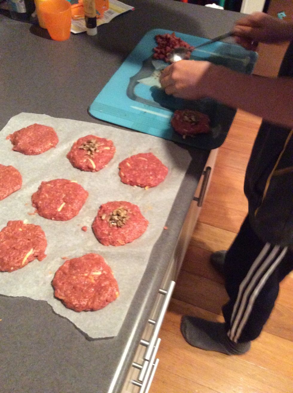 Then add your mushrooms in the center of the burger
