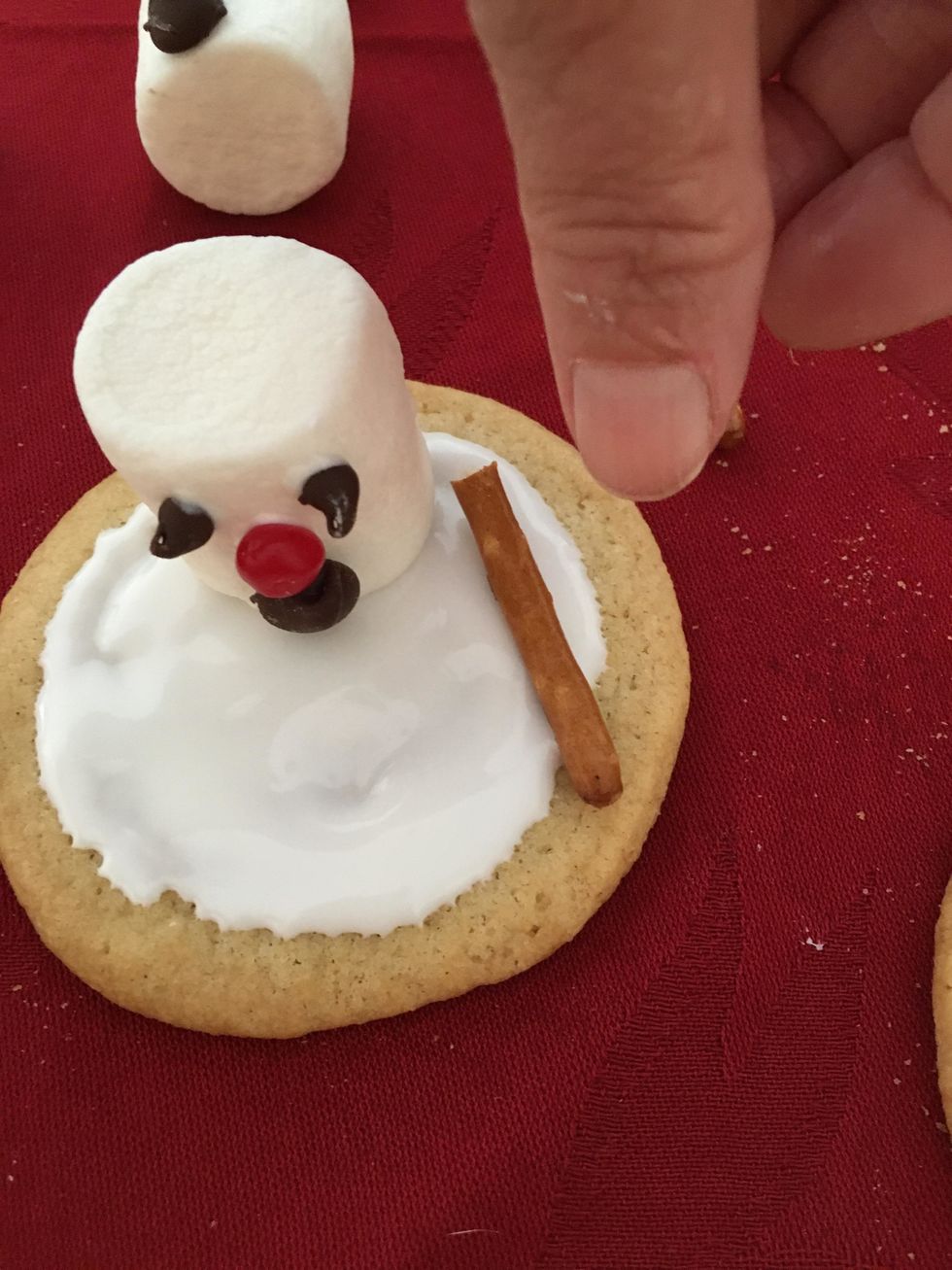 Then add your pretzel stick arms next.