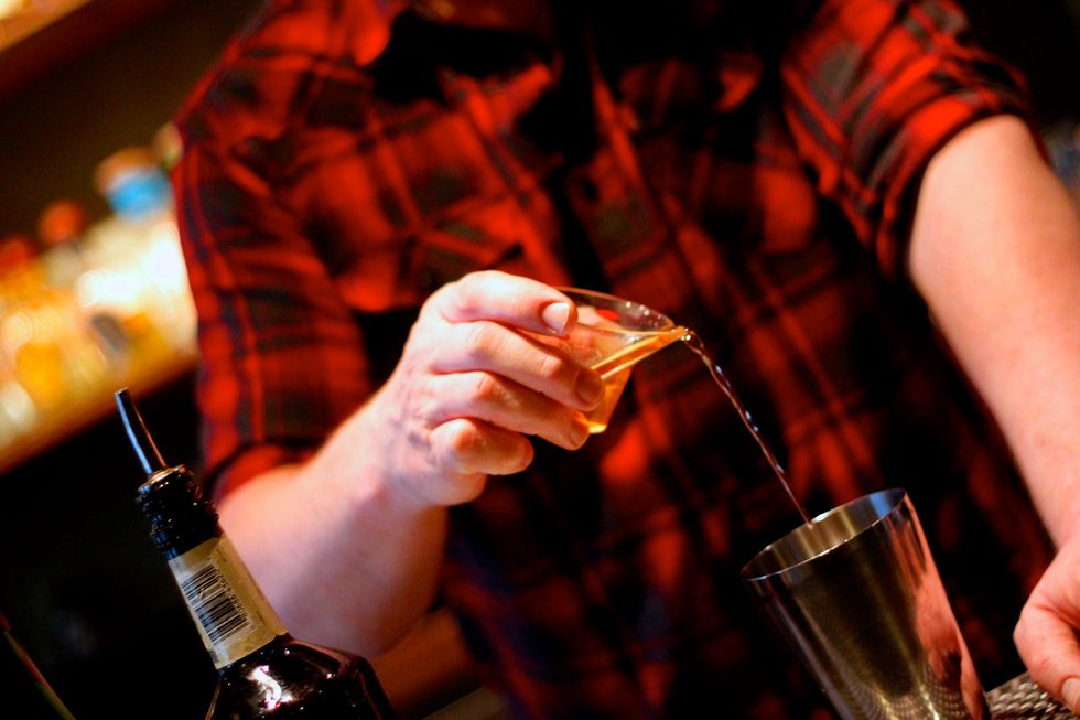 Then add your Rye, allspice dram for spiciness, butternut squash puree (squash roasted with white wine and sugar), and egg whites.