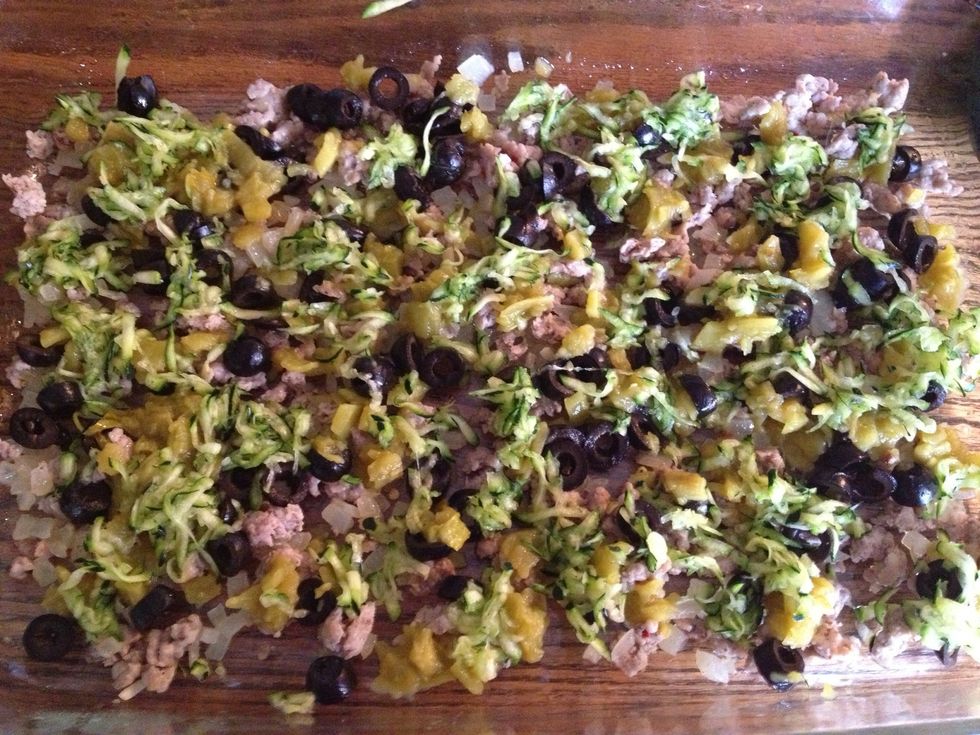 Then added the drained olives, chiles, and zucchini.