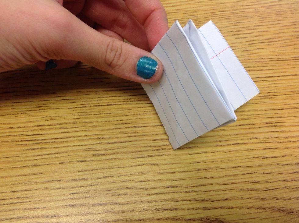 Then after fold again into square on both parts