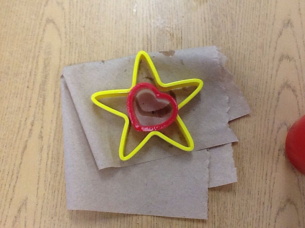 Then after using the cookie cutter place on a paper towel to dry
