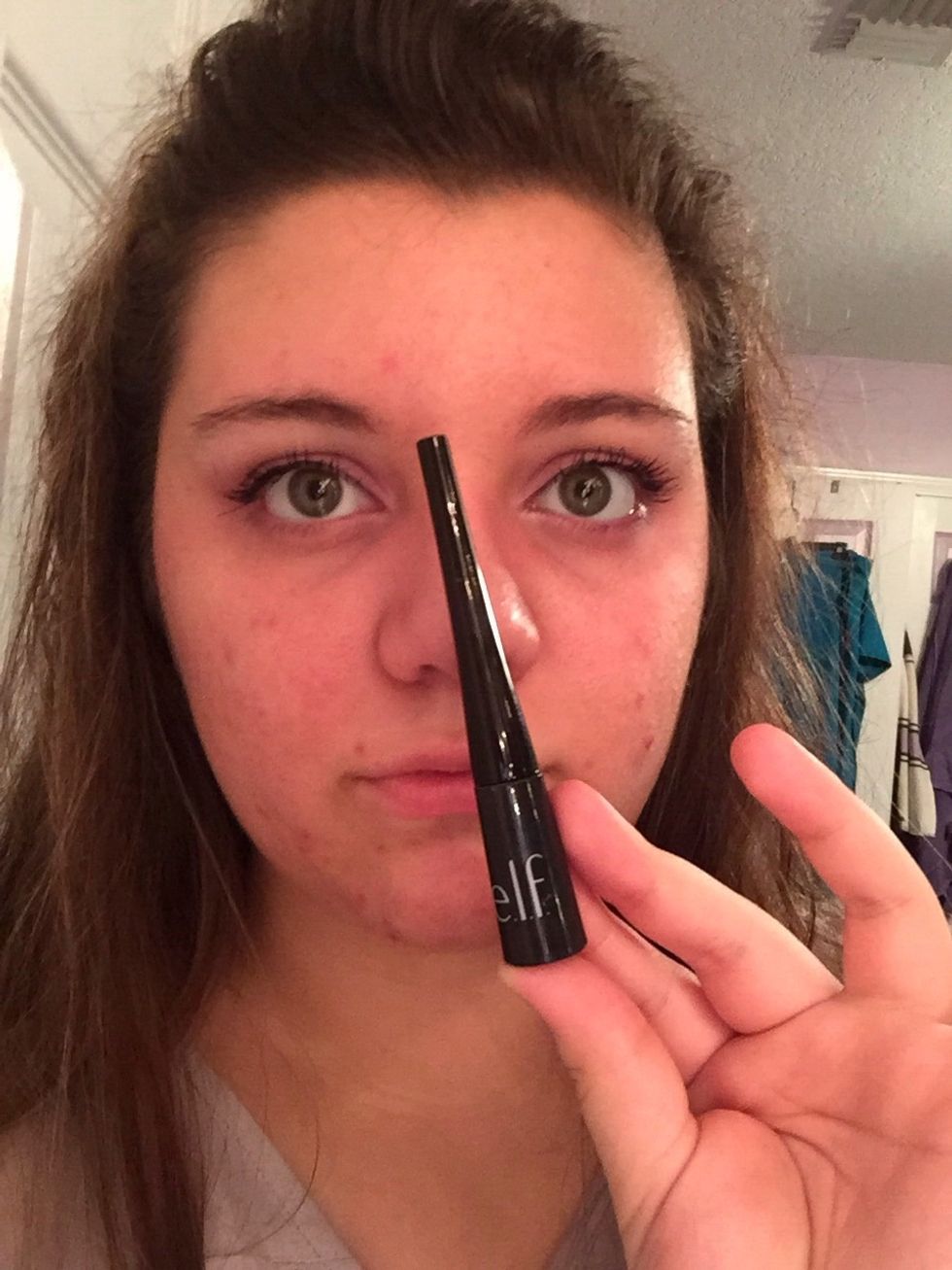 Then apply a small line of eyeliner on the eyelid next to the eyelashes.